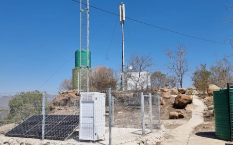 A small high site tower with solar panles to power equipment