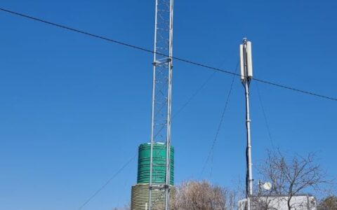 Tower with Pt-Pt and Pt-Mpt radios plus panels and equipment cabinet